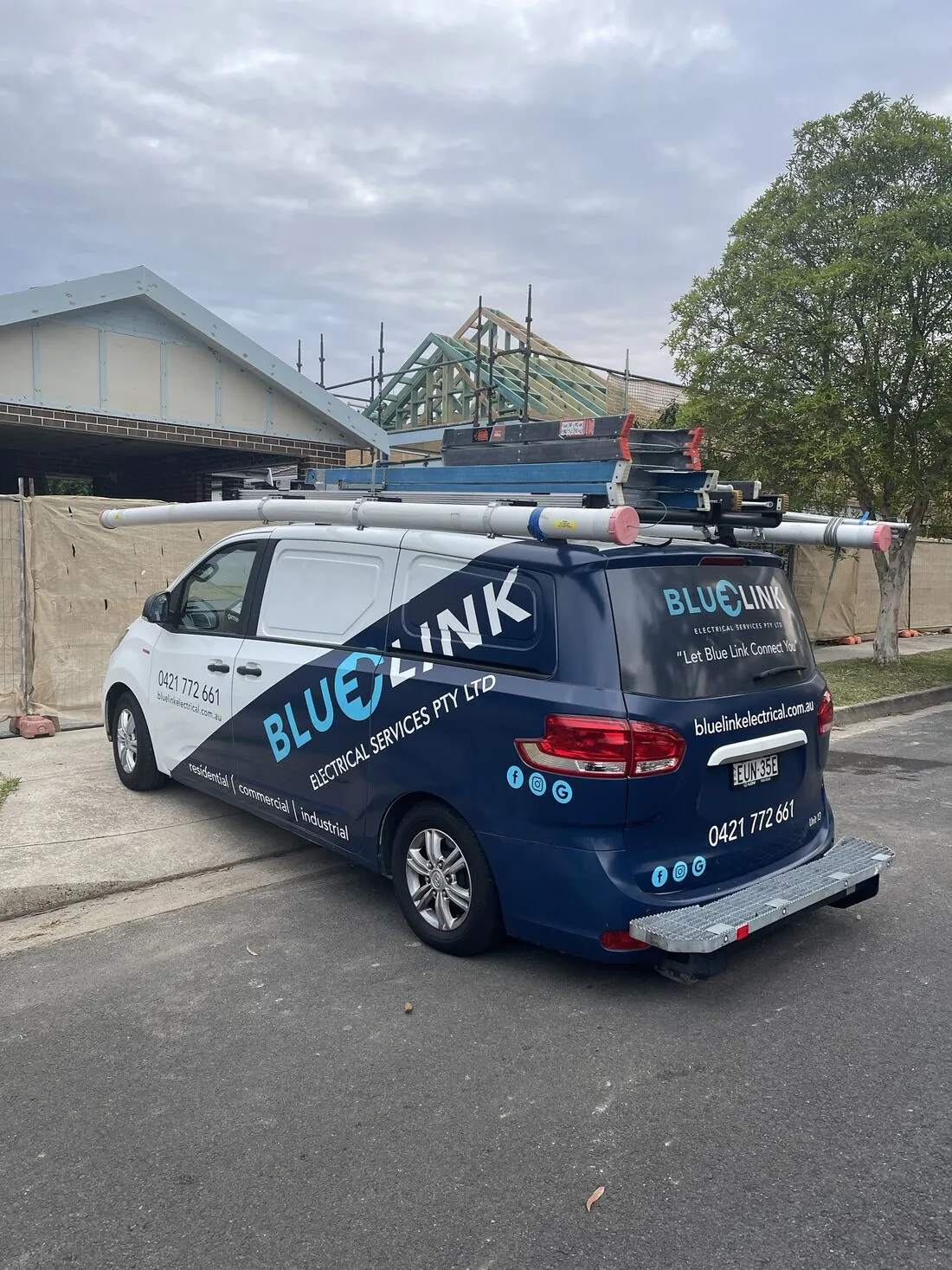 Blue Link Electrical Services van with ladders and conduit