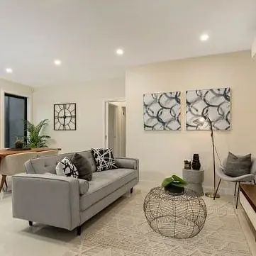 Living room with recessed LED downlights in a white ceiling